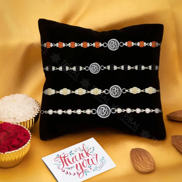 Bracelets TRIBAL ORNAMENTS Trendy cultural style Aum or OM Mantra 925 sterling silver Rakhi bracelet in rudrakshblack basilwhite basil and silver beaded chain rk271 Bracelets TRIBAL ORNAMENTS Trendy cultural style Aum or OM Mantra 925 sterling silver Rakhi bracelet in rudrakshblack basilwhite basil and silver beaded chain rk271