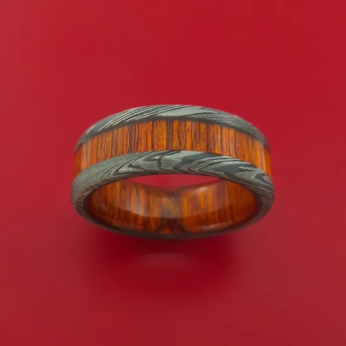 Lashbrook Damascus Steel Ring with Hardwood Inlay and Interior Hardwood Sleeve Custom Made Band Rings Lashbrook Damascus Steel Ring with Hardwood Inlay and Interior Hardwood Sleeve Custom Made Band Rings