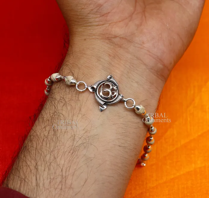 TRIBAL ORNAMENTS Bracelets Divine Aum OM Rakhi 925 sterling silver handmade stylish gorgeous Rakhi bracelet amazing Rudraksha Tulsi beaded bracelet Rakhi rk186 TRIBAL ORNAMENTS Bracelets Divine Aum OM Rakhi 925 sterling silver handmade stylish gorgeous Rakhi bracelet amazing Rudraksha Tulsi beaded bracelet Rakhi rk186
