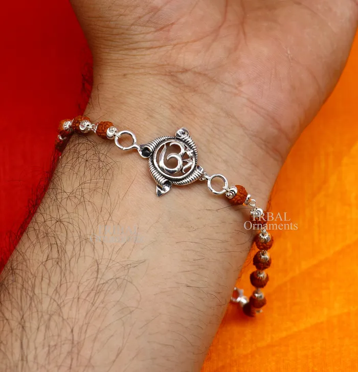 TRIBAL ORNAMENTS Bracelets Divine Aum OM Rakhi 925 sterling silver handmade stylish gorgeous Rakhi bracelet amazing Rudraksha Tulsi beaded bracelet Rakhi rk186 TRIBAL ORNAMENTS Bracelets Divine Aum OM Rakhi 925 sterling silver handmade stylish gorgeous Rakhi bracelet amazing Rudraksha Tulsi beaded bracelet Rakhi rk186